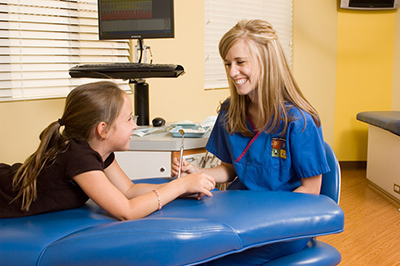Hygienist with Child at the Pediatric Dentist Office in Casa Grande, Mesa and Chandler, AZ